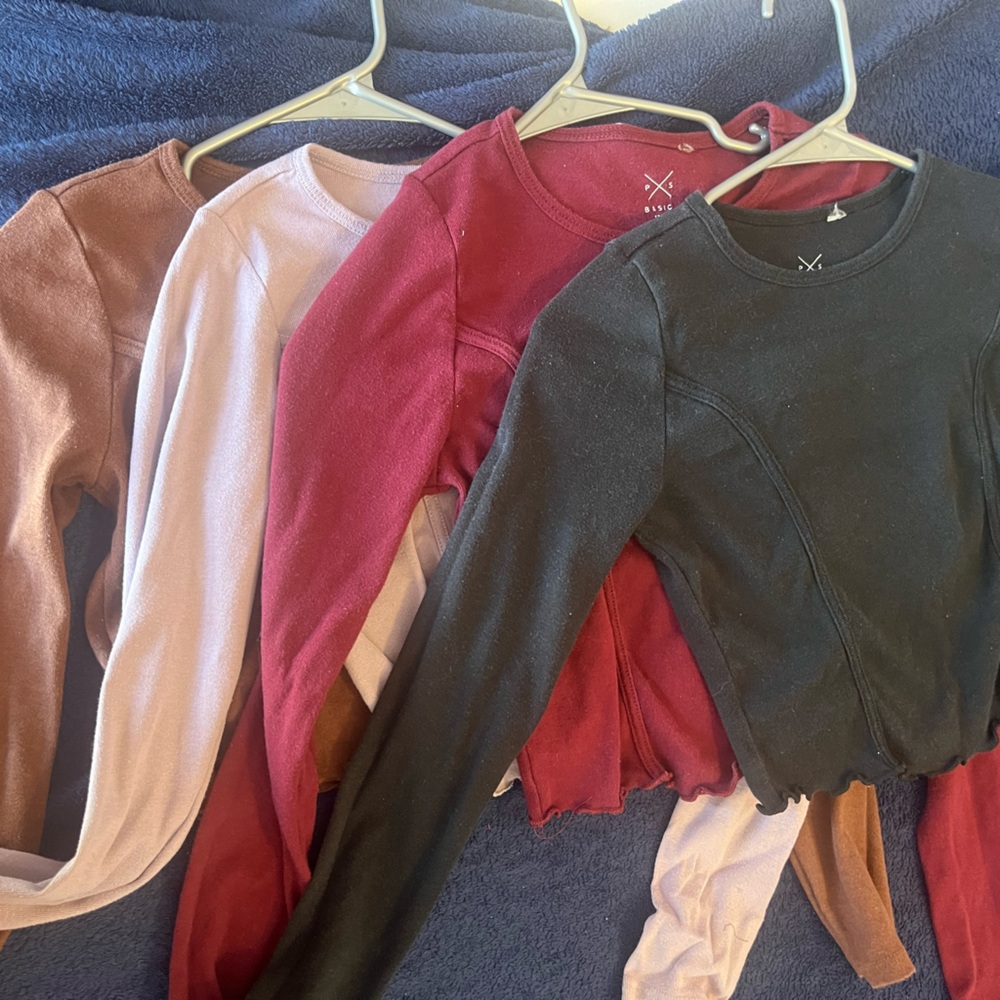 Four pack bundle of pacsun long sleeve tshirts.
